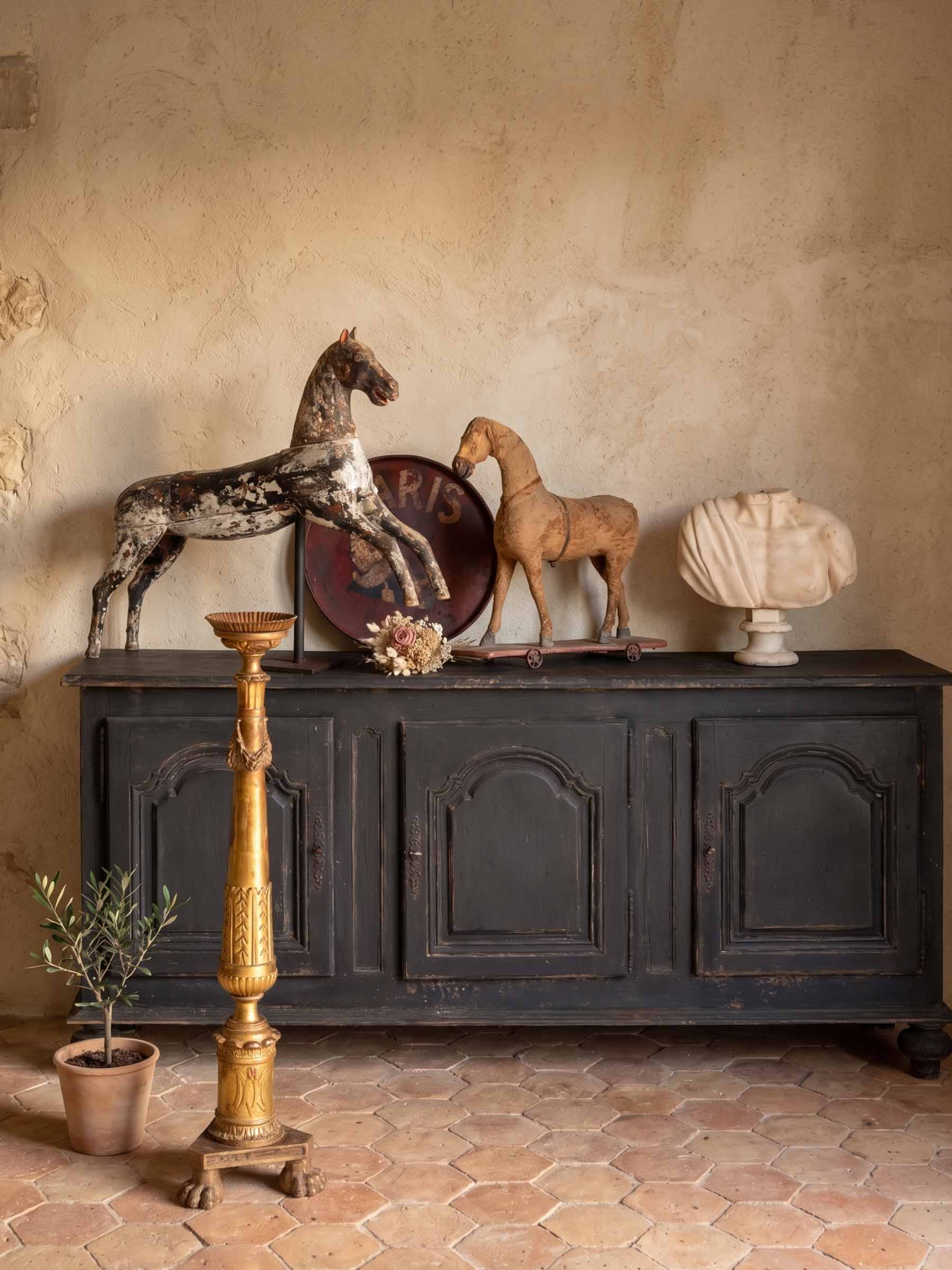 Rustic wooden wheeled platform sculpture