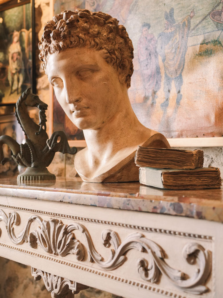 Vintage ochre-toned bust sculpture