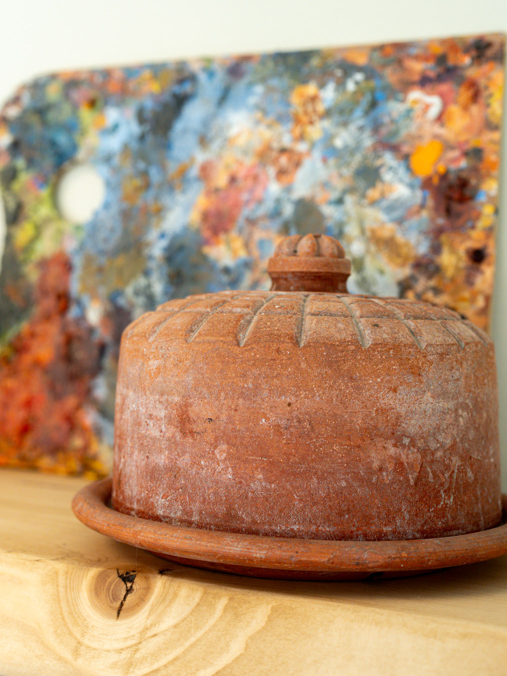 Hand-carved geometric butter keeper