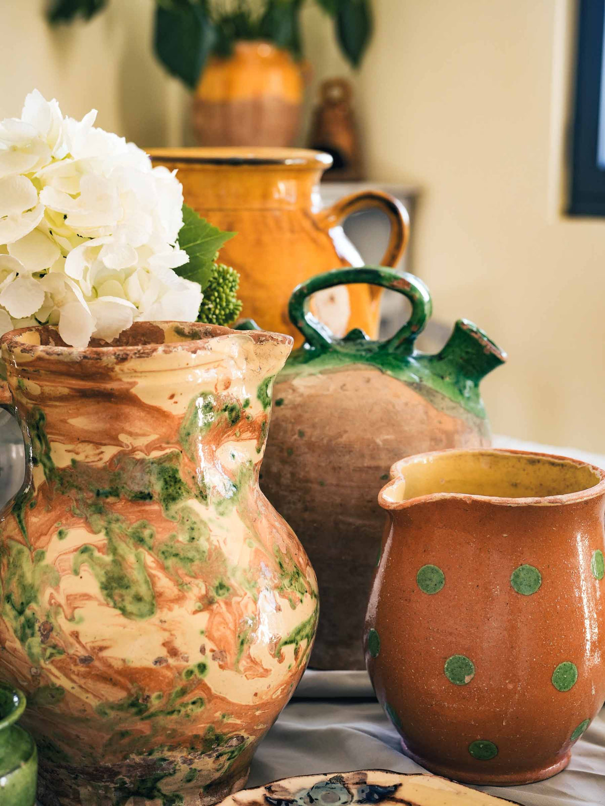 Glaze loss adds depth vintage pitcher