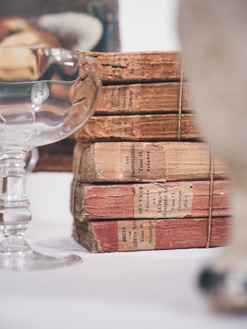 Aged French speckled paperback volumes
