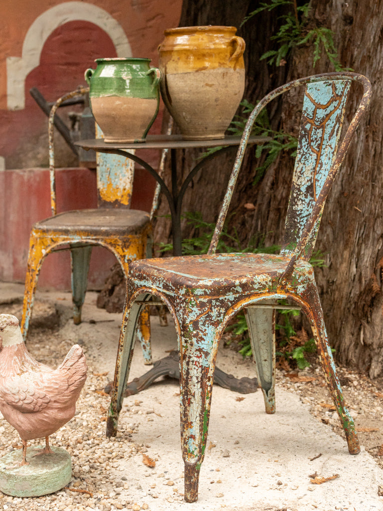 Weathered turquoise steel chairs