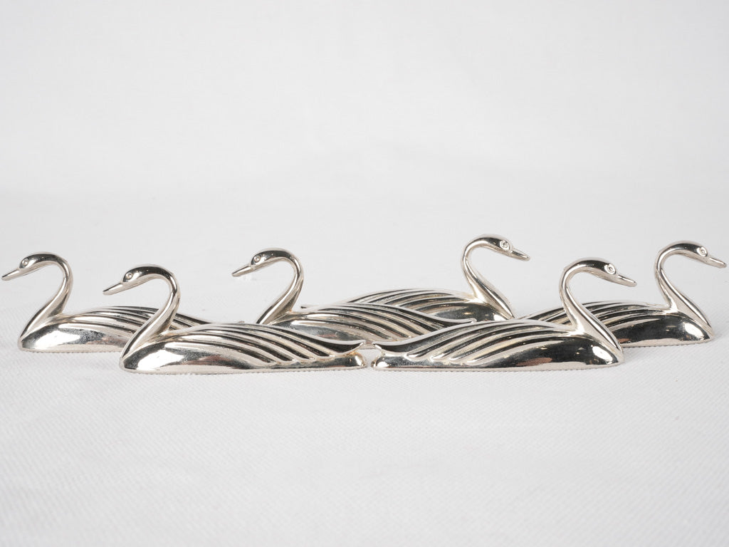 Stylish floating swan knife holders