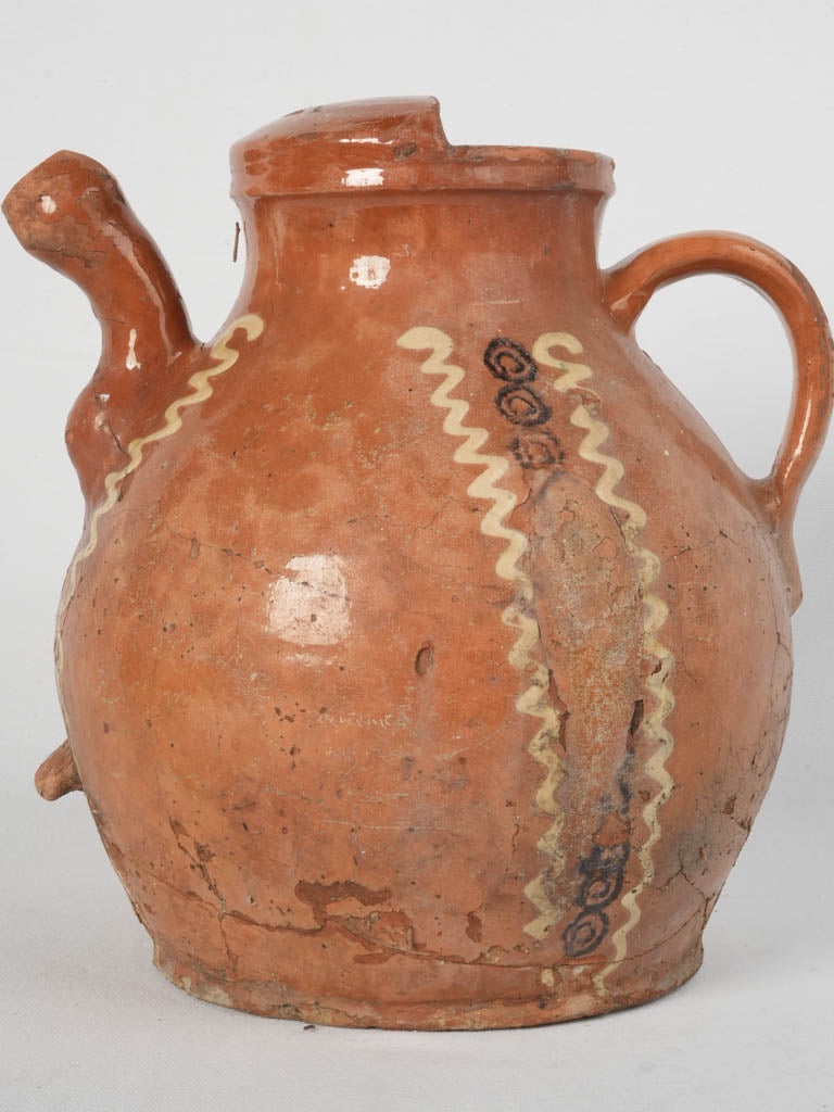 Decorative hand-painted cream and dark brown jug