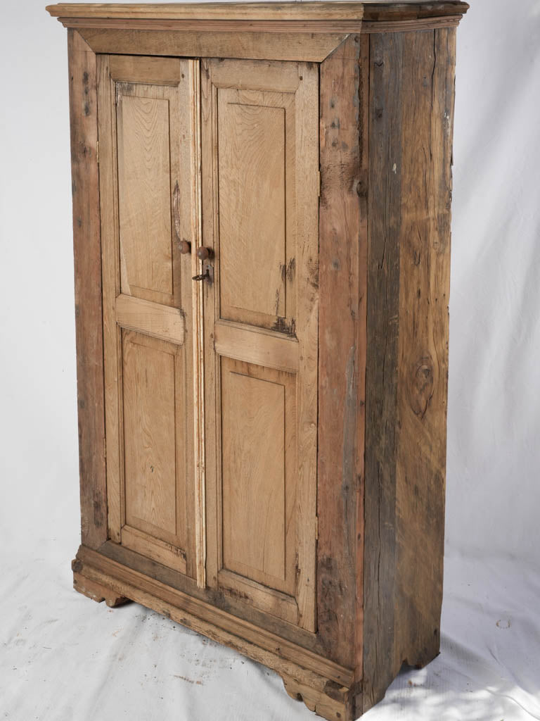 Antique rustic wooden armoire