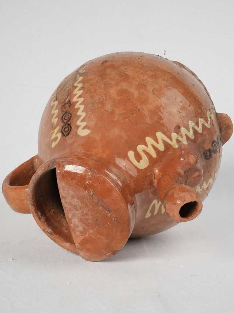 Traditional warm orange-brown terracotta jug