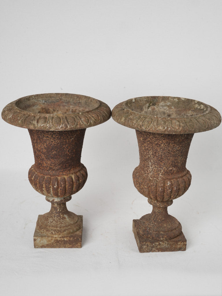 Weathered 19th-century urns