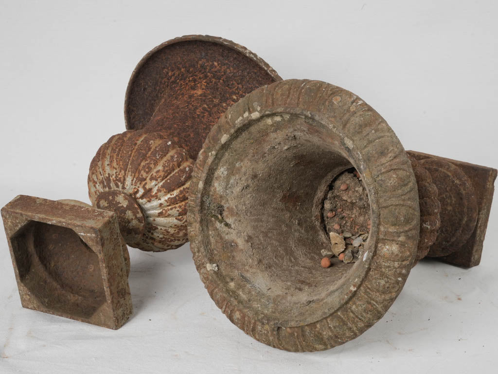 Charming antique iron urns