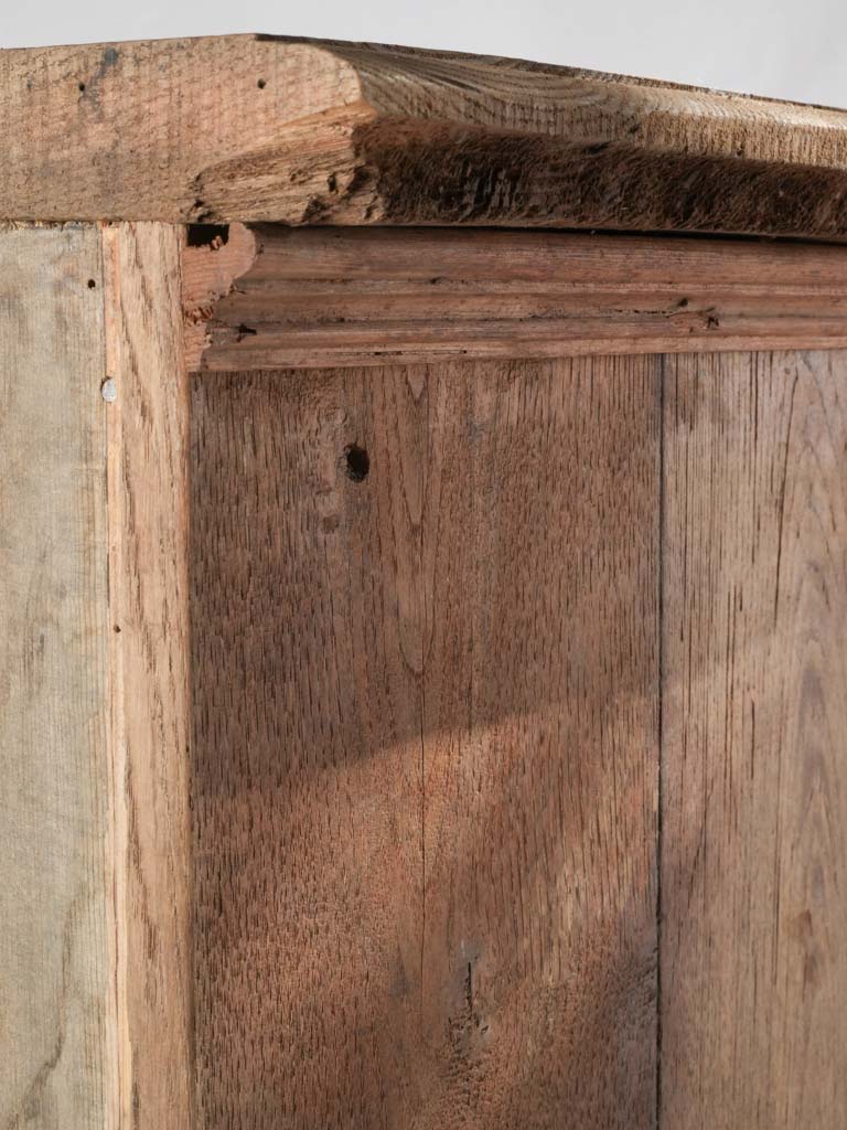 Warm exposed wood grain armoire