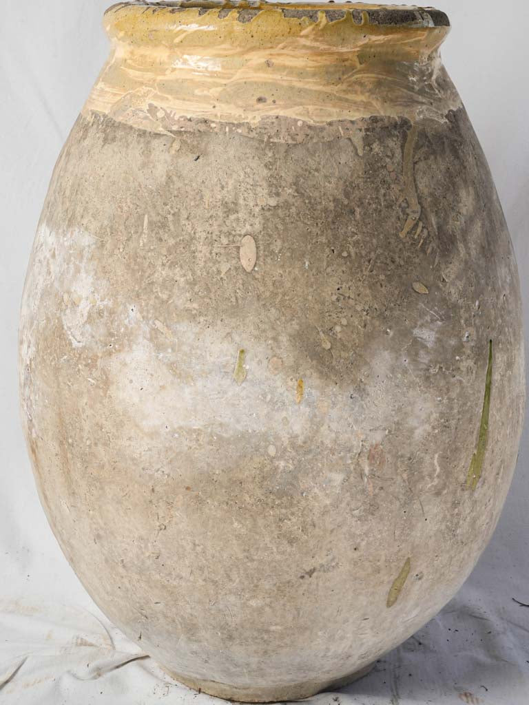 Rustic terracotta olive oil jar