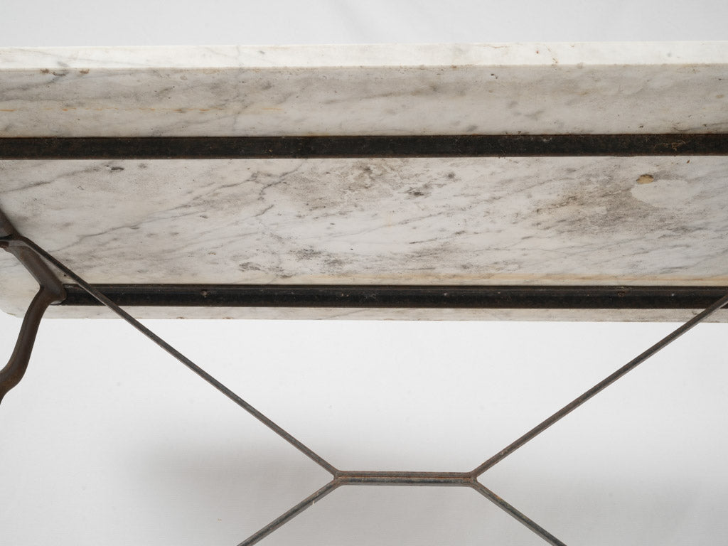 Graceful vintage cast iron table