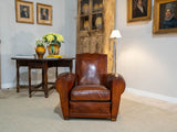 Pair of antique French leather club chairs - moustache back