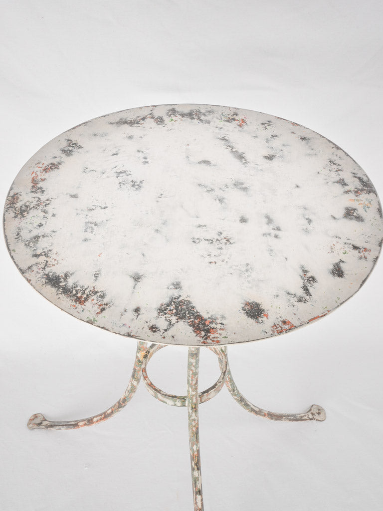 Time-worn French patio bistro table