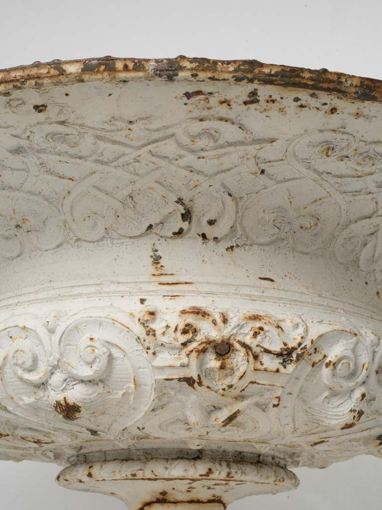 Grand weathered iron garden urns