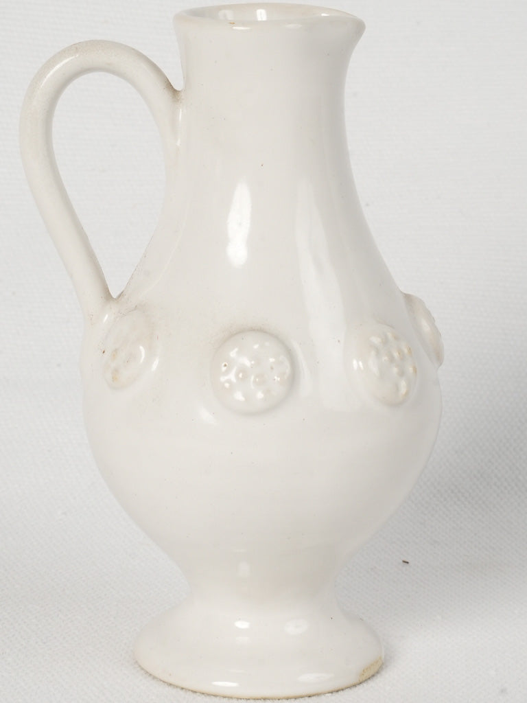 Timeless cream-colored Tessier vessel