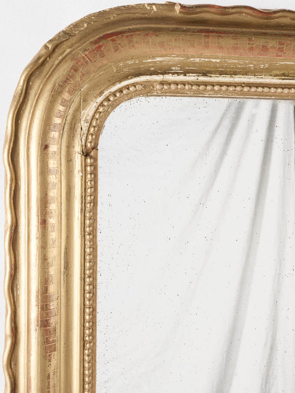 Classic gold-framed decorative wall mirror
