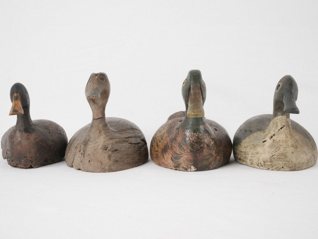 Classic patinated wooden duck collectibles