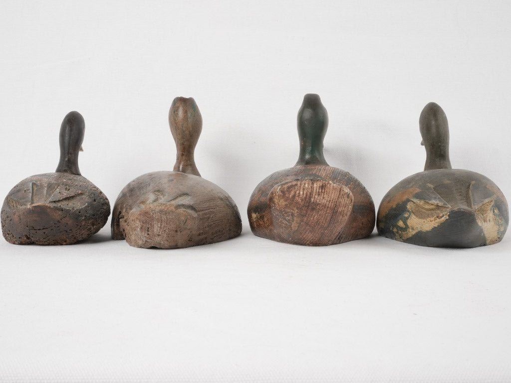 Charming aged decoy duck set