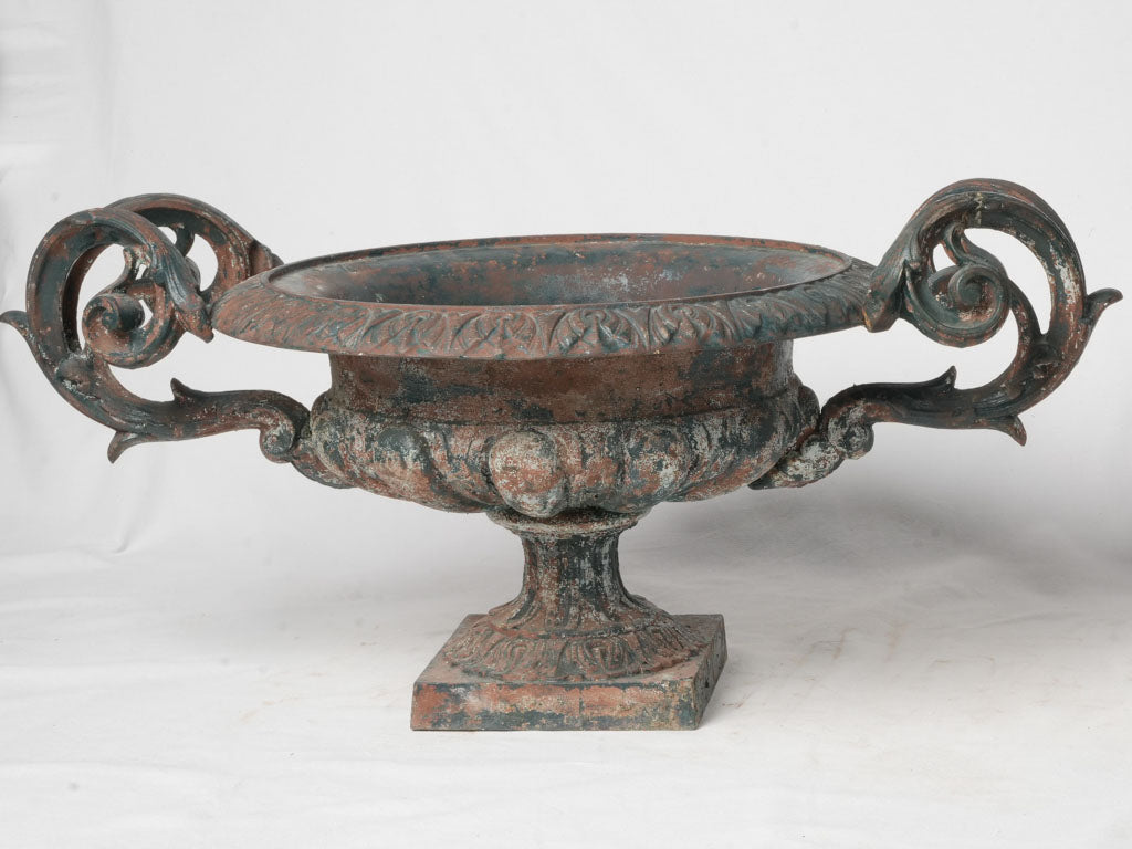 Historic timeworn iron planters