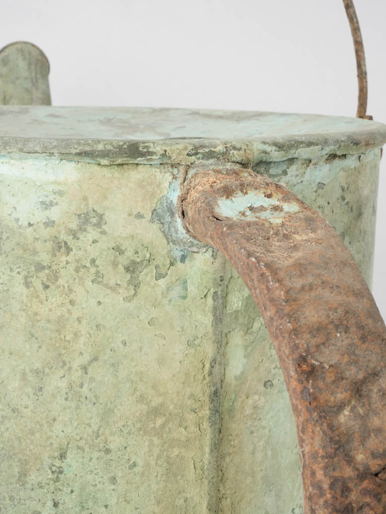 Aged copper with greenish patina can