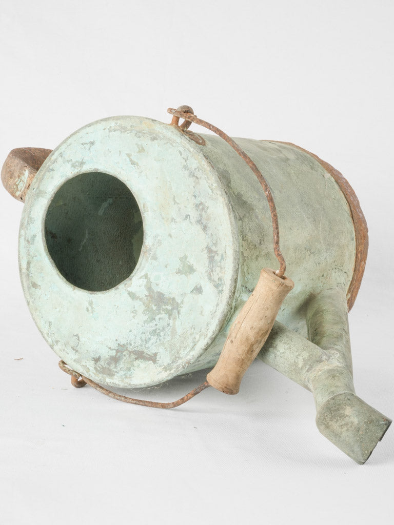 Historical agricultural copper watering tool