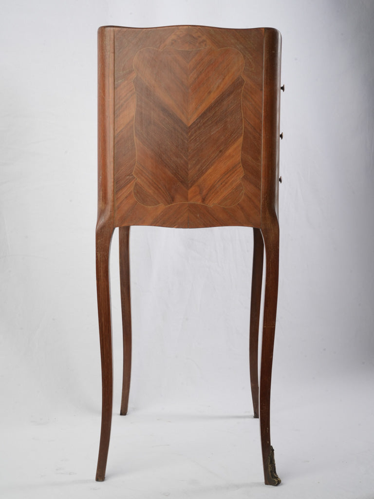 Delicate bronze sabots dresser