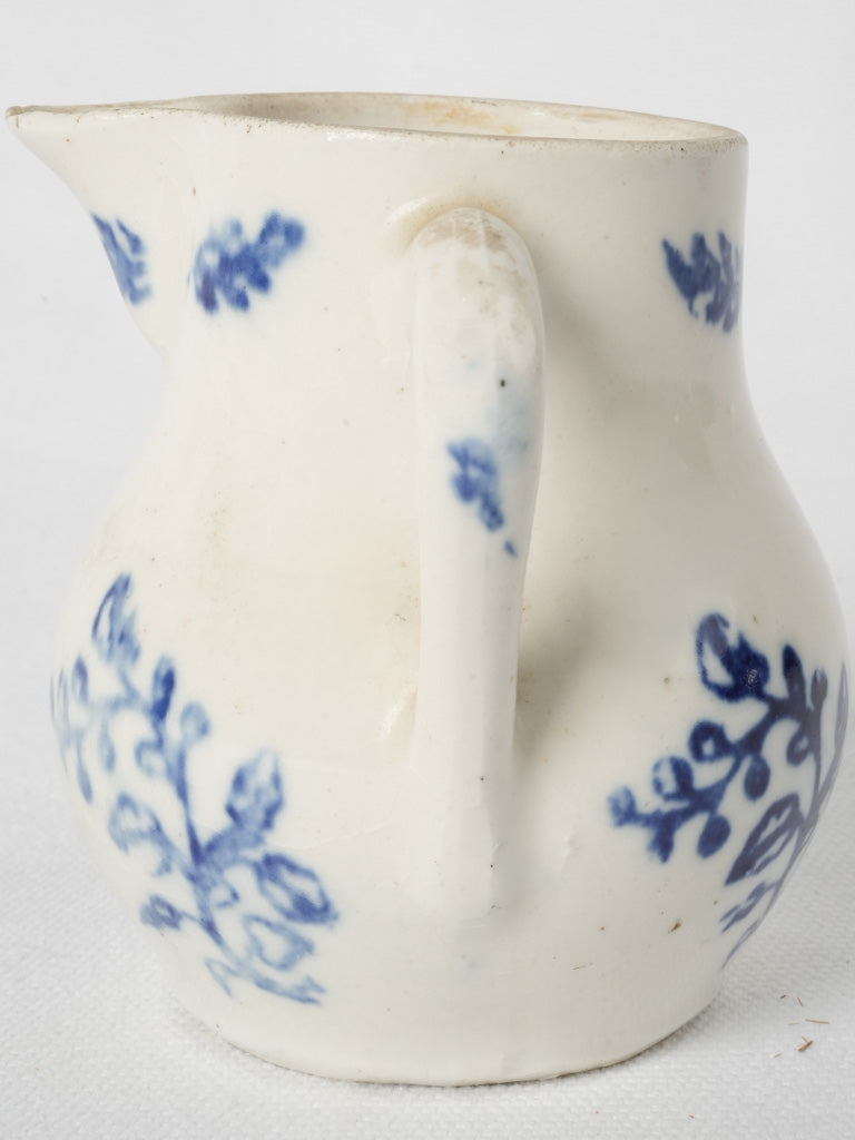 Delightful 19th-century white ceramic creamer