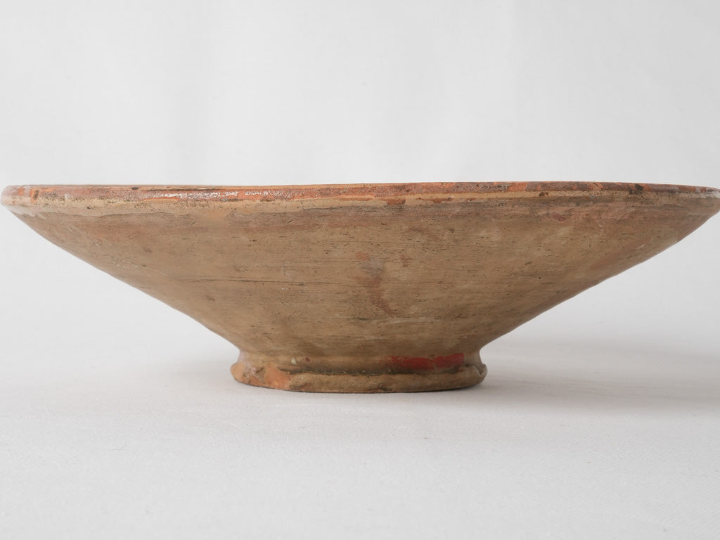 Antique warm mustard-color glazed pottery plate