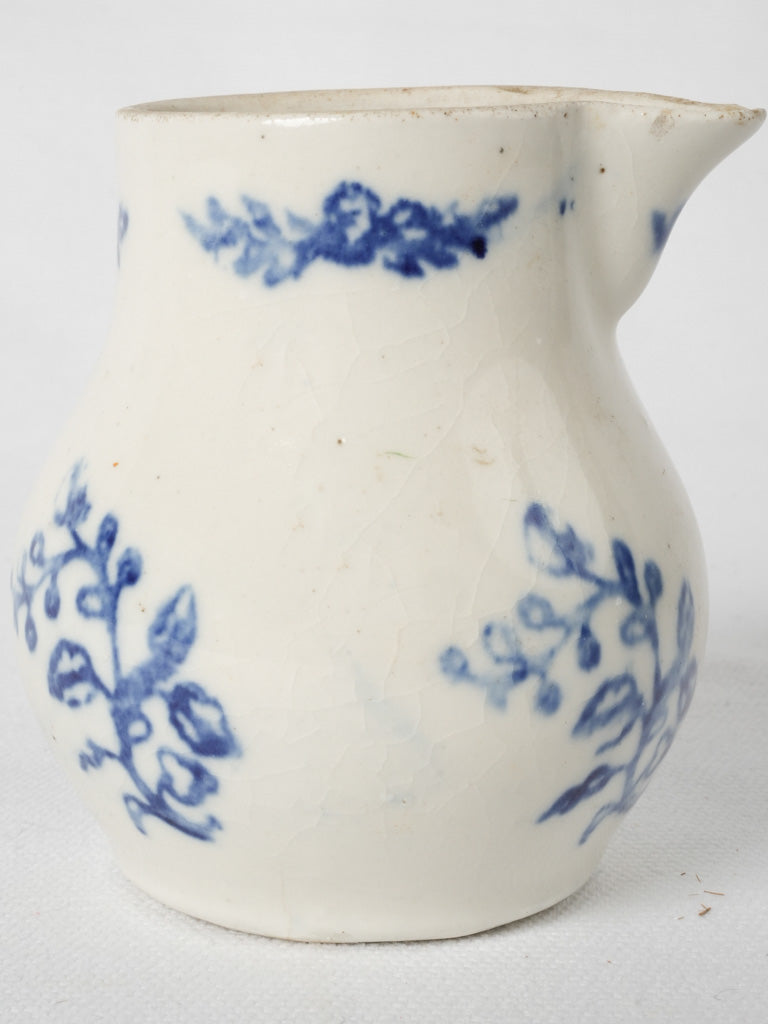 Vintage petit creamer with floral accents