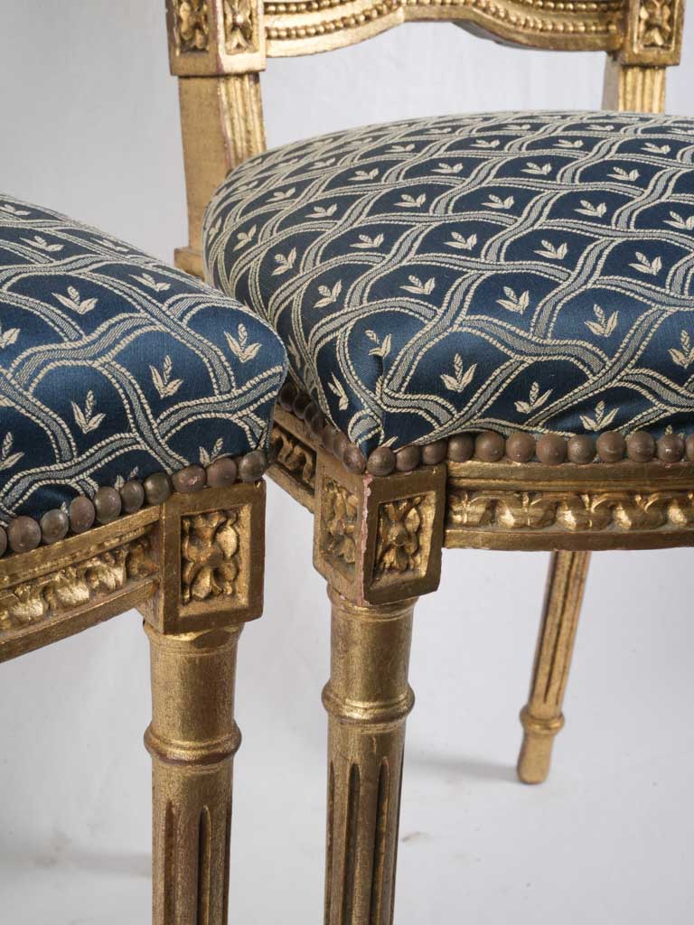 Decorative foliate cresting chairs