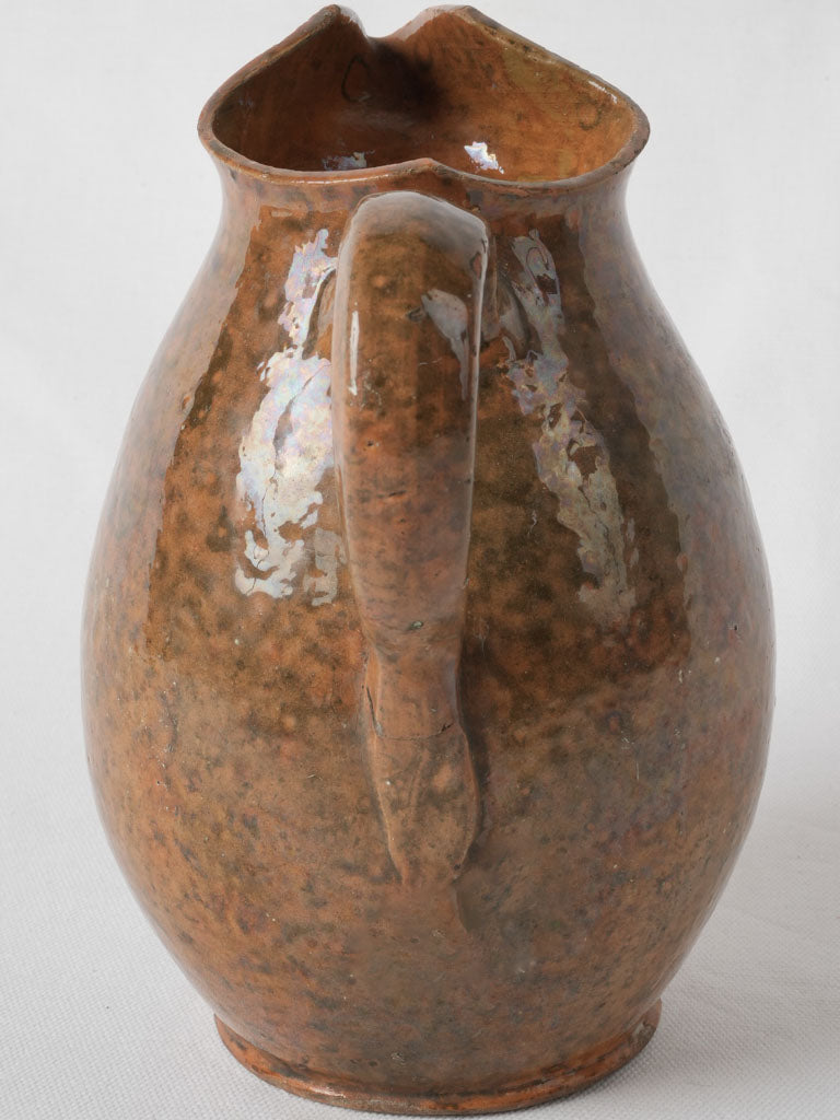 Mottled French mountain antique ceramic pitcher