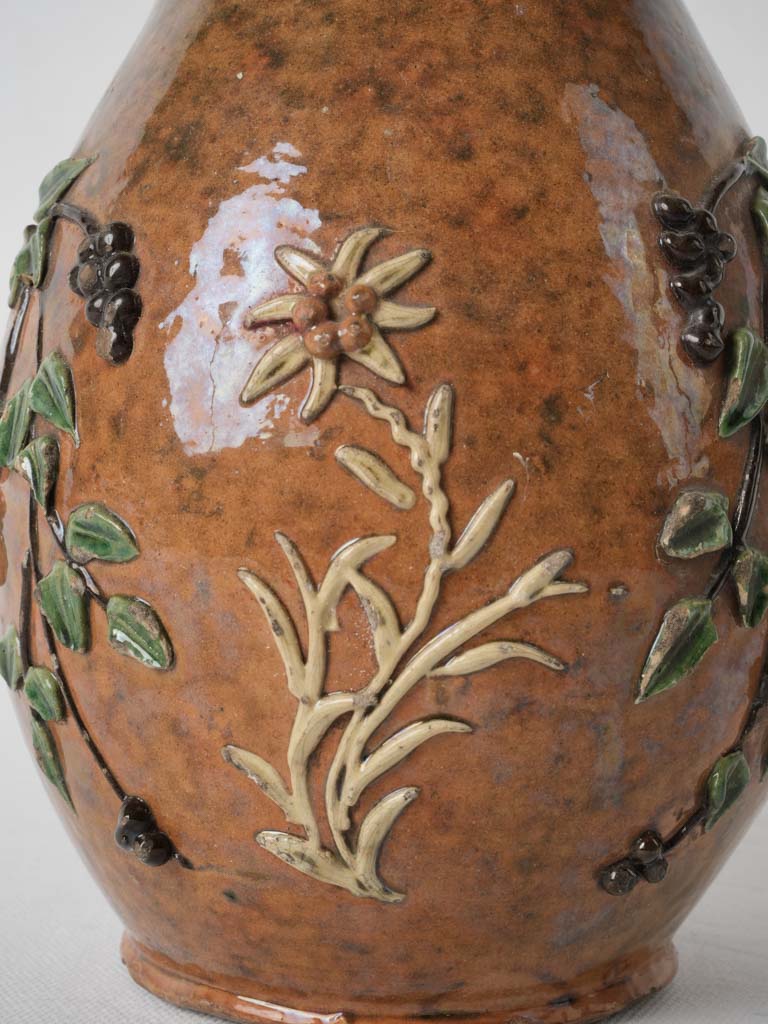Aged antique Savoyard floral glazed pitcher