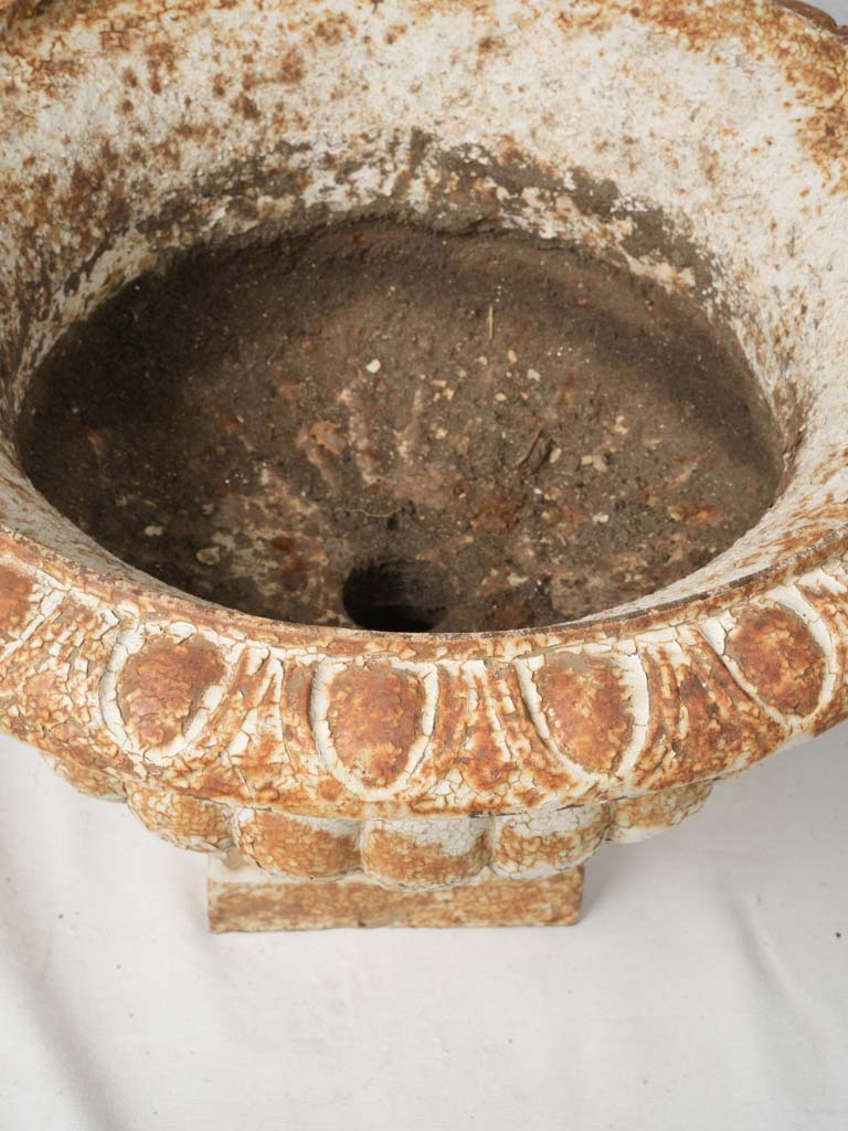 Antique scalloped cast iron planters