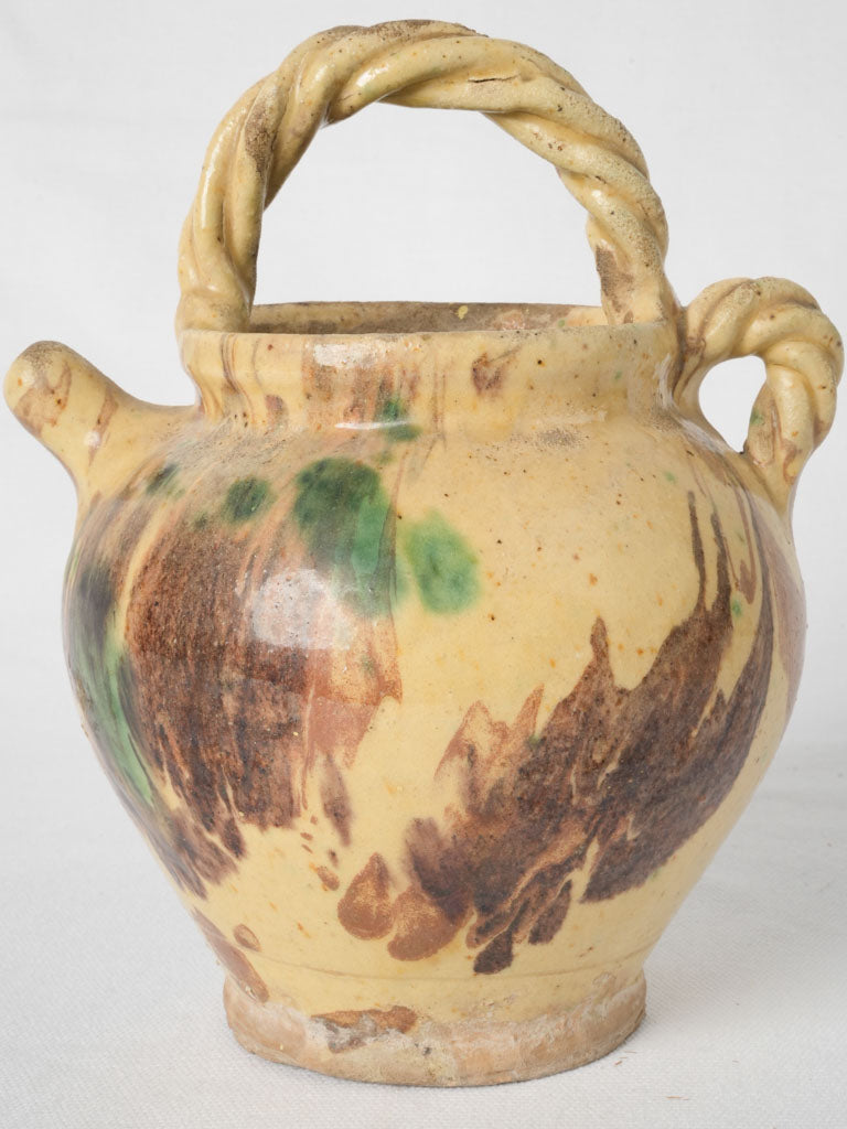 Aged swirl patterned ceramic cruche