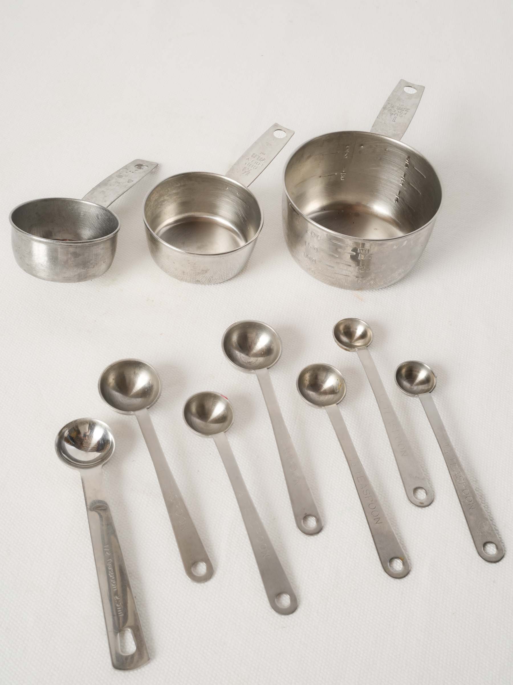 Vintage French Stainless Steel Measuring Cups with Peg Rails