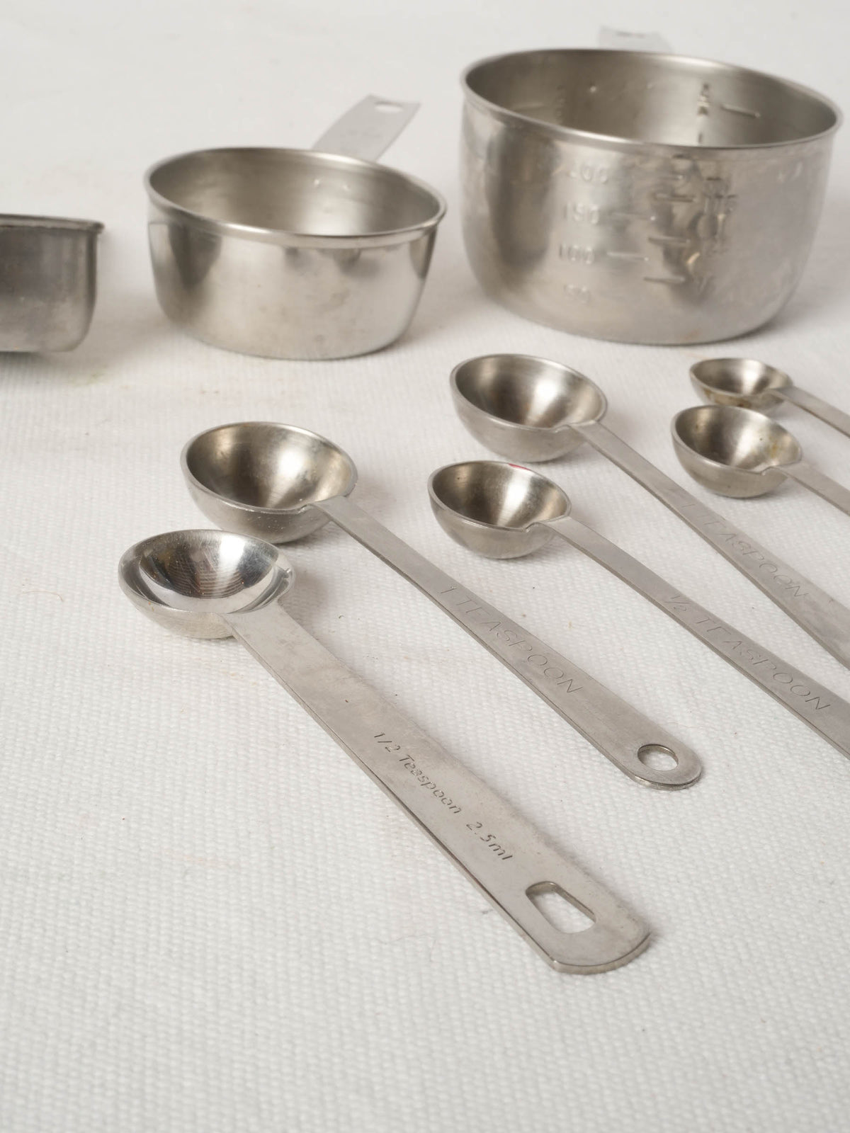 Vintage French Stainless Steel Measuring Cups with Peg Rails