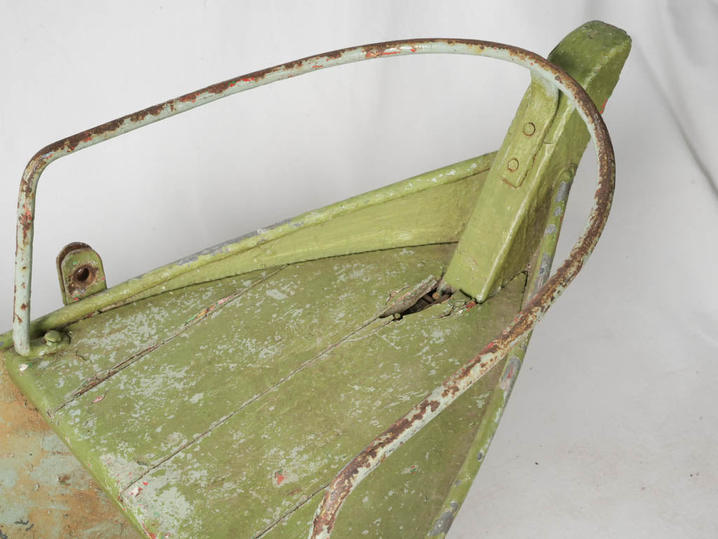 Whimsical weathered green boat seat