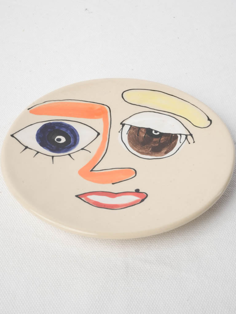 Hand-painted mismatched-eyes dessert plate