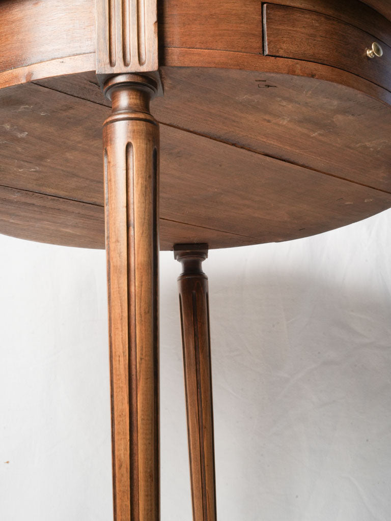 Mellowed brass detail antique table