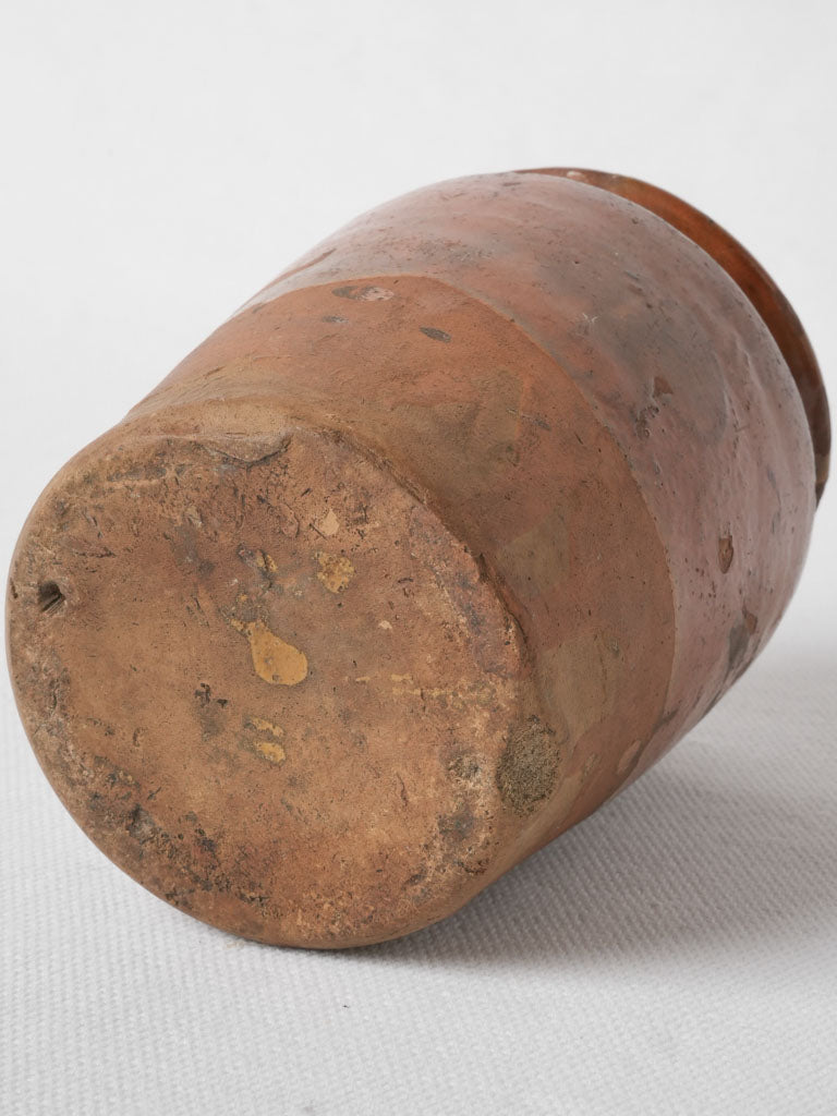 Elegant ochre glazed honey pot
