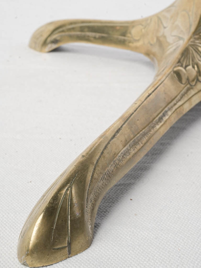 Ornate botanical motif brass stand