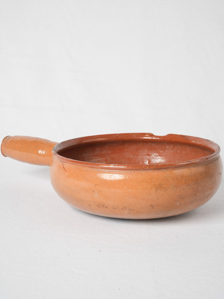 Vintage ochre-glazed French cooking skillet