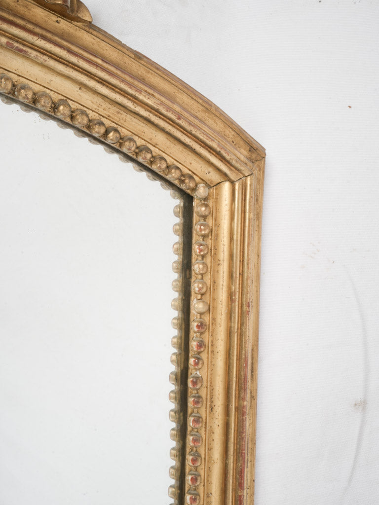 Warm honeyed-tone giltwood mirror