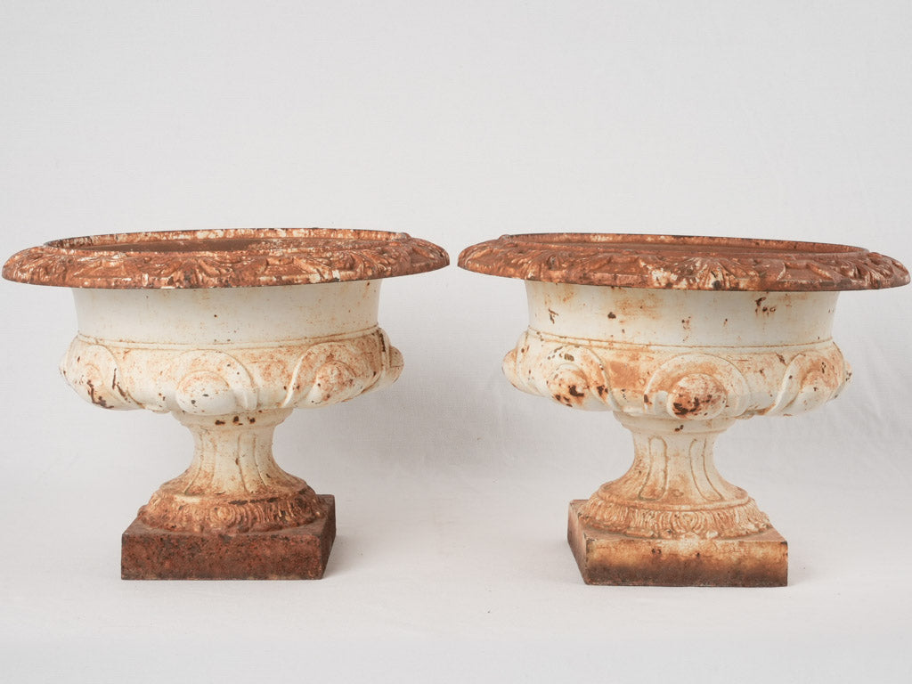 Rustic patina Medici urn pair
