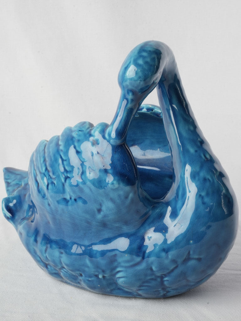 Sculptural blue swan centerpiece