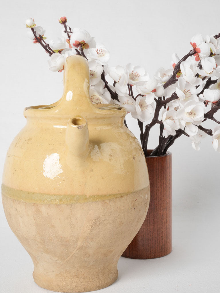 Pale yellow glazed vintage ewer