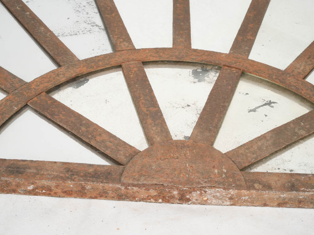 Antique silver-backed iron mirror