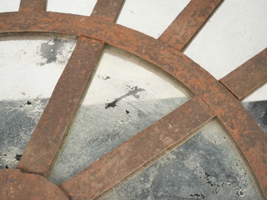 Semi-circular vintage iron mirror