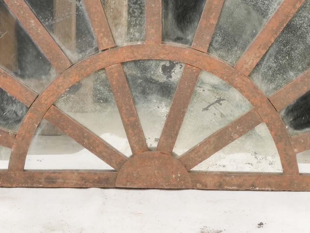Charming aged iron architectural mirror