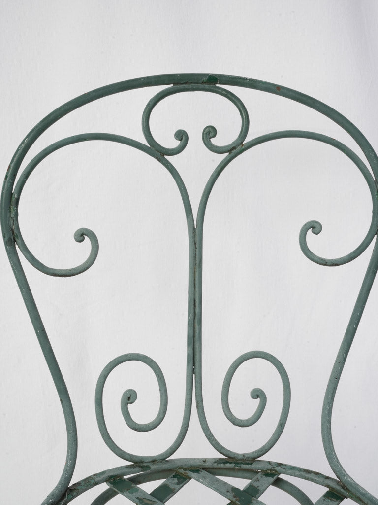Aged green patina garden chair